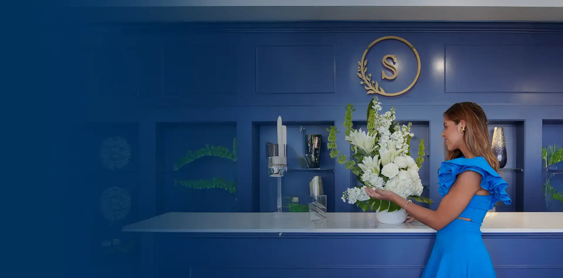 Girl with a white roses arrangement for Mother's Day campaign