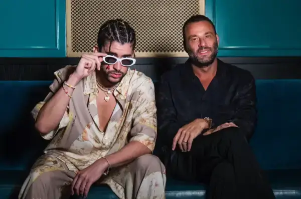 Bad Bunny and David Grutman posing for Gekko restaurant